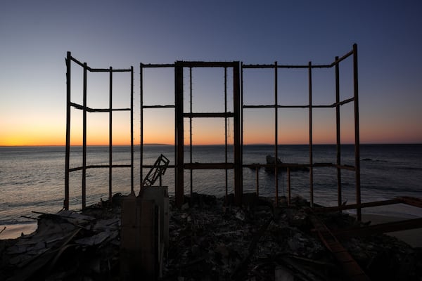 A beach front home destroyed by the Palisades Fire is seen in Malibu, Calif., Wednesday, Jan. 15, 2025. (AP Photo/Jae C. Hong)