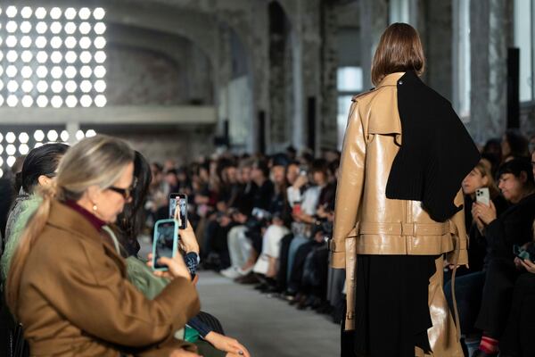 A model wears a creation as part of the Sacai Fall/Winter 2025-2026 Womenswear collection presented in Paris, Monday, March 10, 2025. (Photo by Scott A Garfitt/Invision/AP)