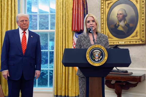 Attorney General Pam Bondi speaks after being sworn in by Supreme Court Associate Justice Clarence Thomas, in the Oval Office of the White House, Wednesday, Feb. 5, 2025, in Washington, as President Donald Trump looks on. (AP Photo/Evan Vucci)