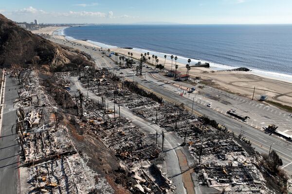 An aerial view shows the devastation left by the Palisades Fire in the Pacific Palisades section of Los Angeles, Monday, Jan. 27, 2025. (AP Photo/Jae C. Hong)