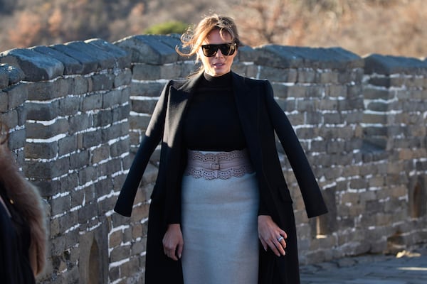 FILE - U.S. first lady Melania Trump walks along the Mutianyu Great Wall section in Beijing on Nov. 10, 2017. (AP Photo/Ng Han Guan, File)