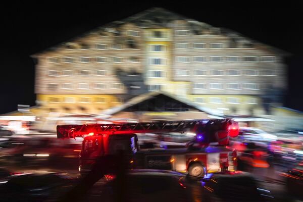 A firefighting truck leaves the scene where a fire broke out at a hotel in the ski resort of Kartalkaya, located in Bolu province, northwest Turkey, on Tuesday, Jan. 21, 2025. (AP Photo/Francisco Seco)