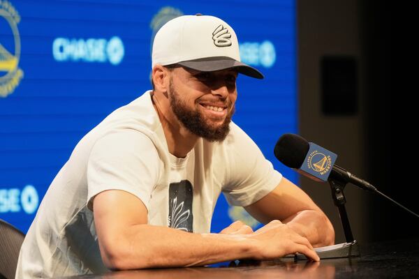 Golden State Warriors guard Stephen Curry speaks during a news conference at the NBA basketball team's facility in San Francisco, Thursday, May 15, 2025. (AP Photo/Jeff Chiu)