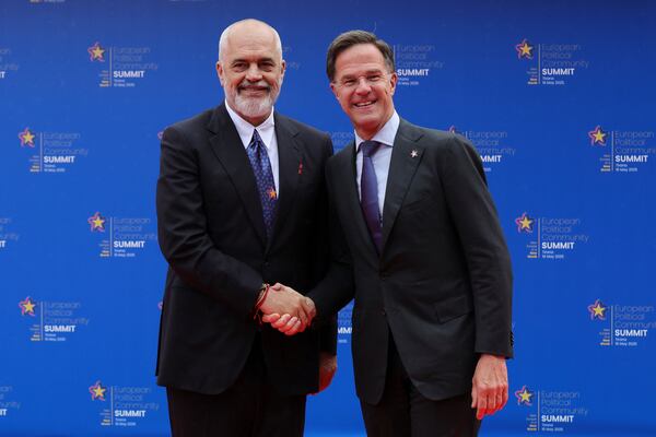 Albanian Prime Minister Edi Rama, left, welcomes NATO Secretary General Mark Rutte ahead of a summit where the leaders of 47 European countries and organizations will discuss security, defense and democratic standards against the backdrop of Russia's war on Ukraine, in Tirana, Albania, Friday, May 16, 2025. (AP Photo/Vlasov Sulaj)