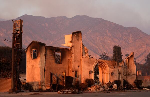 FILE - The Altadena Community Church is pictured the day after it was destroyed by the Eaton Fire, Thursday, Jan. 9, 2025, in Altadena, Calif. (AP Photo/Chris Pizzello, File)