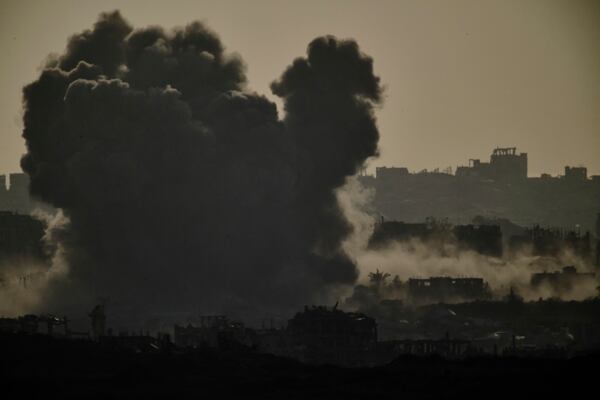 Smoke rises to the sky following an Israeli bombardment in the Gaza Strip as seen from southern Israel, Thursday, May 22, 2025. (AP Photo/Leo Correa)