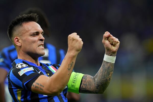 Inter Milan's Lautaro Martinez celebrates after scoring his side's opening goal during the Champions League semifinal second leg soccer match between Inter Milan and Barcelona at San Siro stadium in Milan , Italy, Tuesday, May 6, 2025.. (Spada/LaPresse via AP)