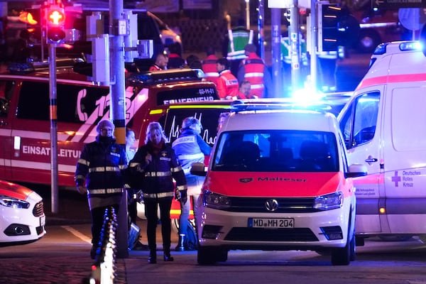 Emergency services work in a cordoned-off area near a Christmas Market, after an incident in Magdeburg, Germany, Friday, Dec. 20, 2024. (AP Photo/Ebrahim Noroozi)