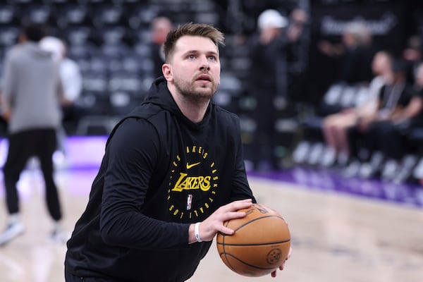 Los Angeles Lakers guard Luka Doncic warms up before an NBA basketball game against the Utah Jazz, Wednesday, Feb. 12, 2025, in Salt Lake City. (AP Photo/Rob Gray)