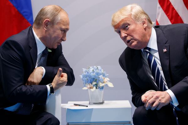 FILE - U.S. President Donald Trump meets with Russian President Vladimir Putin at the G-20 Summit in Hamburg, Germany, on July 7, 2017. (AP Photo/Evan Vucci, File)