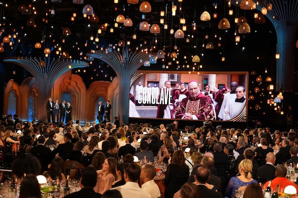 John Lithgow, from left, Ralph Fiennes, Sergio Castellitto, and Isabella Rossellini accepts the award for outstanding performance by a cast in a motion picture for "Conclave" during the 31st annual Screen Actors Guild Awards on Sunday, Feb. 23, 2025, at the Shrine Auditorium in Los Angeles. (AP Photo/Chris Pizzello)