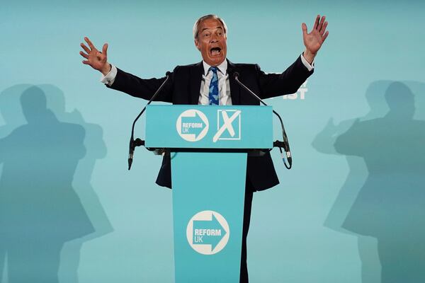 Reform UK party leader Nigel Farage speaks during a campaign event at Stafford Showground, Stafford, England, whilst campaigning for this week's local elections, Wednesday April 30, 2025. (Jacob King/PA via AP)