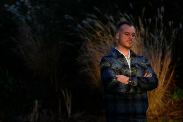 Recreational rugby player Sean McDowell, whose SafeSport case investigator Jason Krasley was fired after being arrested for stealing drug money in his previous job as a police officer, poses for a portrait Wednesday, Dec. 18, 2024, in Seattle. (AP Photo/Lindsey Wasson)