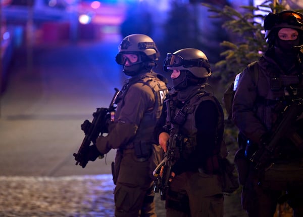 Special police forces attend an incident at the Christmas market in Magdeburg, Germany, Friday Dec. 20, 2024. (Heiko Rebsch/dpa via AP)