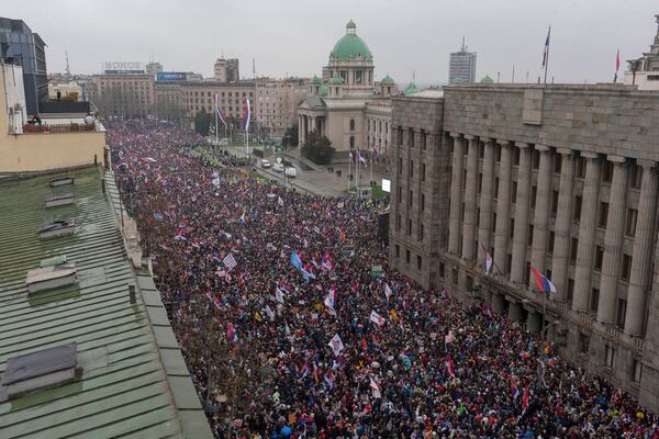 Tens of thousands gather in front of the Serbian parliament during a major anti-corruption rally led by university students in Belgrade, Serbia, Saturday, March 15, 2025. (AP Photo/Marko Drobnjakovic)