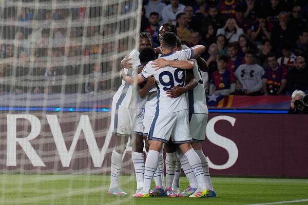 Inter Milan players celebrate after a goal during the Champions League semifinal first leg soccer match between Barcelona and Inter Milan in Barcelona, Spain, Wednesday, April 30, 2025. AP Photo/Emilio Morenatti)