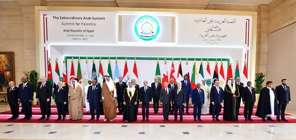 In this photo provided by Egypt's presidency media office, Arab leaders pose during the emergency Arab summit at Egypt's New Administrative Capital, just outside Cairo, Tuesday, March 4, 2025. (Egyptian Presidency Media Office via AP)