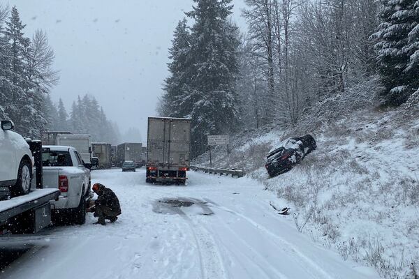 This photo provided by the Washington State Department of Transportation vehicles piled up on a snowy Interstate 5 highway in Southwestern Wash., Thursday, Feb. 13, 2025. (Washington State Department of Transportation via AP)