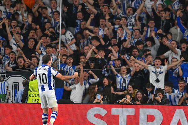 Real Sociedad's Mikel Oyarzabal celebrates after scoring his side's opening goal during the Europa League round of 16 first leg soccer match between Real Sociedad and Manchester United at the Reale Arena in San Sebastian, Spain, Thursday, March 6, 2025. (AP Photo/Miguel Oses)