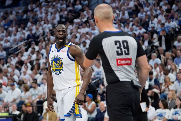 Golden State Warriors forward Draymond Green (23) reacts toward referee Tyler Ford during the second half of Game 2 of an NBA basketball second-round playoff series against the Minnesota Timberwolves, Thursday, May 8, 2025, in Minneapolis. (AP Photo/Abbie Parr)