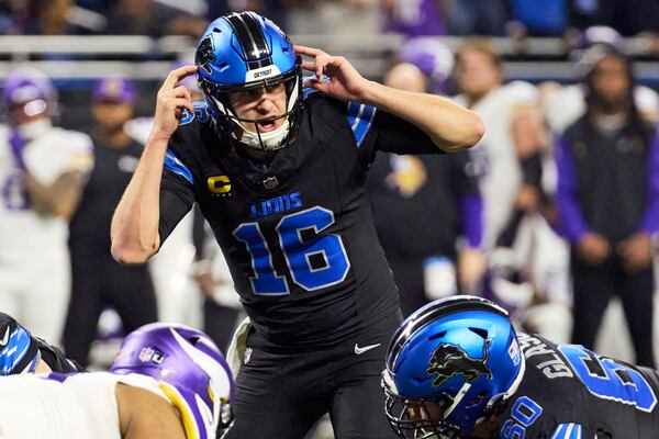 FILE- Detroit Lions quarterback Jared Goff (16) gets set to run a play against the Minnesota Vikings during an NFL football game in Detroit, Sunday, Jan. 5, 2025. (AP Photo/Rick Osentoski, File)