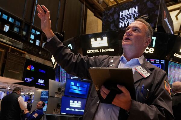 Trader Jonathan Corpina works on the floor of the New York Stock Exchange, Wednesday, May 14, 2025. (AP Photo/Richard Drew)