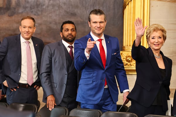 From left, Lee Zeldin, administrator of the Environmental Protection Agency nominee; Kash Patel, FBI director nominee; Pete Hegseth, secretary of defense nominee; and Linda McMahon, education secretary nominee; gesture after the 60th Presidential Inauguration in the Rotunda of the U.S. Capitol in Washington, Monday, Jan. 20, 2025. (Chip Somodevilla/Pool Photo via AP)