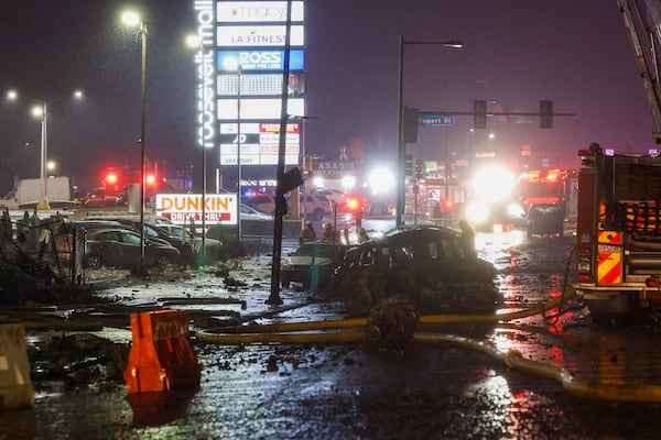 The scene near Roosevelt Boulevard after a small plane crashed near Roosevelt Mall, Friday, Jan. 31, 2025, in Philadelphia. (Steven M. Falk/The Philadelphia Inquirer via AP)