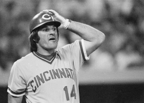 FILE - Pete Rose of the Cincinnati Reds watches as Pirates' first baseman John Milner catches his third inning pop-up, Aug. 14, 1978 in Pittsburgh. (AP Photo/J. Walter Green, File)