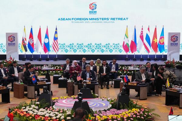 Malaysia's Foreign Minister Mohamad Hasan, center, delivers his speech during the Association of Southeast Asian Nations (ASEAN) Foreign Ministers' Retreat in Langkawi Island, Malaysia, Sunday, Jan. 19, 2025. (AP Photo/Azneal Ishak, Pool)