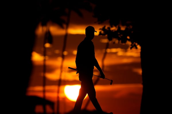 Harris English walks on the 10th green during the first round of the Sony Open golf event, Thursday, Jan. 9, 2025, at Waialae Country Club in Honolulu. (AP Photo/Matt York)