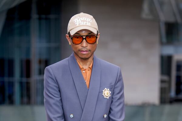 FILE - Pharrell Williams upon arrival at the Louis Vuitton Foundation on the eve of Paris Olympics opening ceremony, Thursday, July 25, 2024, in Paris, France. (AP Photo/Rebecca Blackwell, File)