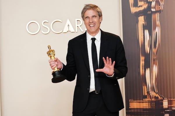 Walter Salles, winner of the award for "I'm Still Here" from Brazil, for best international feature film, poses in the press room at the Oscars on Sunday, March 2, 2025, at the Dolby Theatre in Los Angeles. (Photo by Jordan Strauss/Invision/AP)