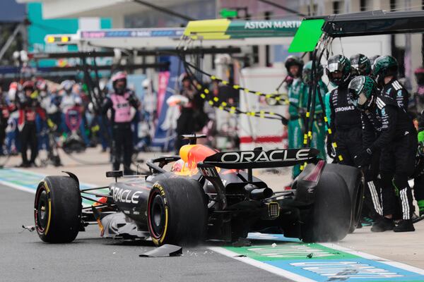 Red Bull driver Max Verstappen of the Netherlands reacts to damages during the Sprint race at the Miami Formula One Grand Prix at the International Autodrome, Saturday, May 3, 2025, in Miami Gardens, Fla. (Shawn Thew/Pool Photo via AP)