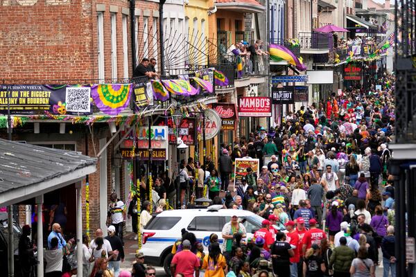 Bourbon Street is seen from a balcony at the Royal Sonesta Hotel on Mardi Gras Day, Tuesday, March 4, 2025 in New Orleans. (AP Photo/Gerald Herbert)