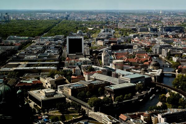 A aeriel view of the area around the Reichstag Building with the glass dome, at center top, of Berlin, Germany, Tuesday, April 29, 2025. (AP Photo/Markus Schreiber)