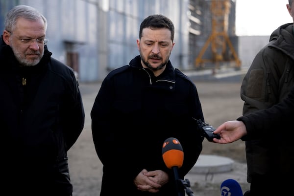 Volodymyr Zelenskyy, president of Ukraine speaks to the press during a media briefing on the territory of Khmelnytskyi Nuclear Power Plant, Ukraine, Thursday, Feb. 13, 2025. (AP Photo/Alex Babenko)