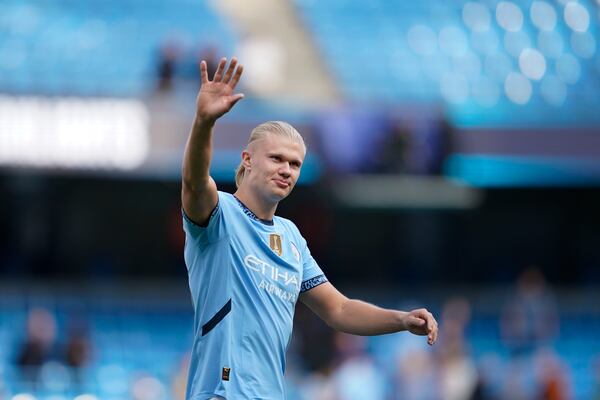 FILE -Manchester City's Erling Haaland waves fans after the English Premier League soccer match between Manchester City and Ipswich Town at the Etihad Stadium in Manchester, England, Aug. 24, 2024. (AP Photo/Dave Thompson, File)