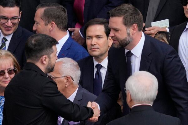 Ukraine's President Volodymr Zelenskyy, left, and Vice President JD Vance greet each other as Secretary of State Marco Rubio, center, looks on ahead of Pope Leo XIV's formal inauguration of his pontificate with a Mass in St. Peter's Square attended by heads of state, royalty and ordinary faithful, Sunday, May 18, 2025. (AP Photo/Gregorio Borgia)