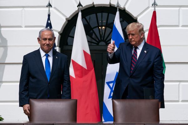 FILE- Israeli Prime Minister Benjamin Netanyahu, left, and President Donald Trump stand as they prepare to depart after the Abraham Accords signing ceremony on the South Lawn of the White House, Sept. 15, 2020, in Washington. (AP Photo/Alex Brandon, File)