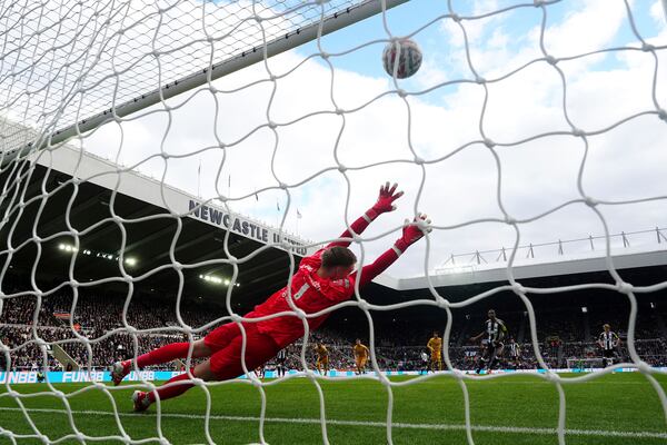 Newcastle United's Alexander Isak scores their side's first goal of the game from a penalty during the FA Cup fifth round match between Newcastle United and Brighton and Hove Albion at St James' Park, Newcastle, England, Sunday, March 2, 2025. (Owen Humphreys/PA via AP)