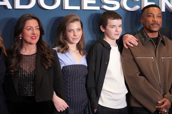 From left, Jo Hartley, Amelie Pease, Owen Cooper and Ashley Walters pose for photographers upon arrival at the special screening for "Adolescence" in London, Wednesday, March 12, 2025. (AP Photo/Kin Cheung)