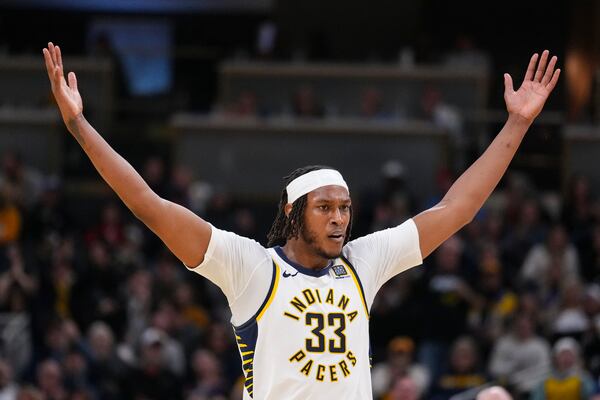 Indiana Pacers center Myles Turner (33) celebrates during the second half of an NBA basketball game against the Atlanta Hawks in Indianapolis, Saturday, Feb. 1, 2025. (AP Photo/Michael Conroy)