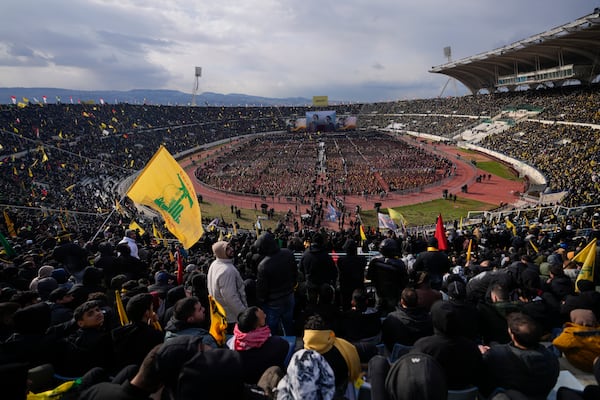 People gather for the funeral ceremony of the Lebanon's late Hezbollah leaders Hassan Nasrallah and Hashem Safieddine at the Sports City Stadium in Beirut, Lebanon, Sunday, Feb. 23, 2025. (AP Photo/Hassan Ammar)