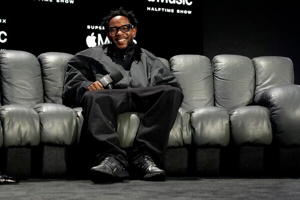 Apple Music Super Bowl LIX Halftime Show performer Kendrick Lamar smiles during a news conference, Thursday, Feb. 6, 2025, in New Orleans ahead of the NFL Super Bowl 59 football game between the Philadelphia Eagles and the Kansas City Chiefs. (AP Photo/Matt York)