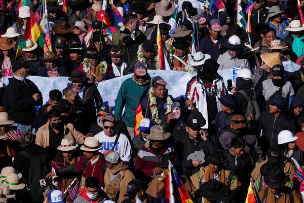 Supporters of former President Evo Morales march towards the offices of the Electoral Tribunal in El Alto, Bolivia, Friday, May 16, 2025. (AP Photo/Juan Karita)