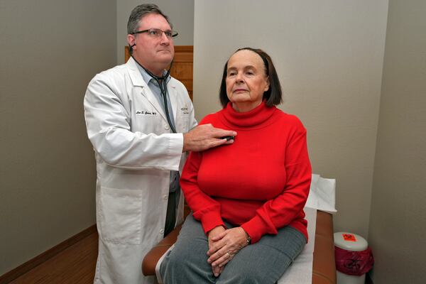 Dr. Lee Gross examines patient Annie Geisel at Epiphany Health Direct Primary Care Tuesday, Jan. 21, 2025, in Port Charlotte, Fla. (AP Photo/Chris O'Meara)