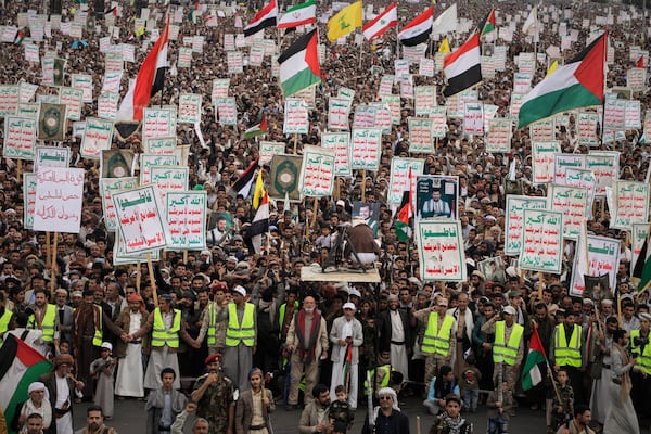 Houthi supporters chant slogans during an anti-U.S. and anti-Israel rally in Sanaa, Yemen, Monday, March 17, 2025. (AP Photo/Osamah Abdulrahman)