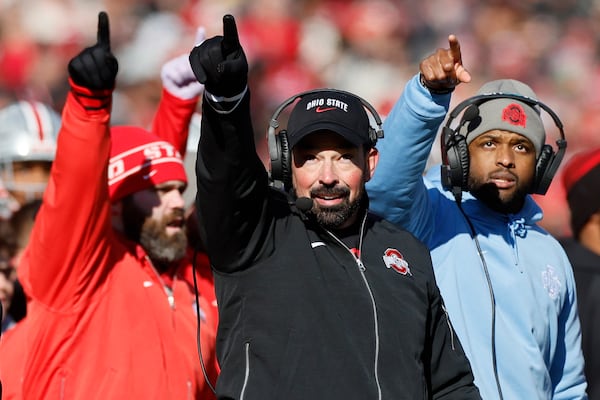 FILE - Ohio State head coach Ryan Day, center, instructs his team against Michigan during an NCAA college football game Saturday, Nov. 30, 2024, in Columbus, Ohio. (AP Photo/Jay LaPrete, File)