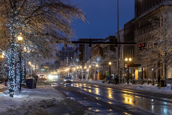 Vehicles drive along Main Street in Lexington, Ky., on Monday, Jan. 6, 2025. (Ryan C. Hermens/Lexington Herald-Leader via AP)